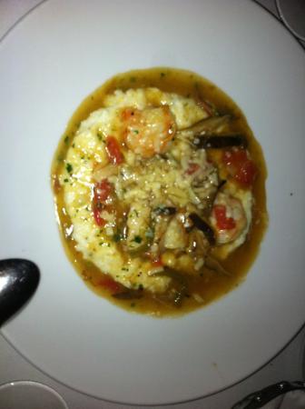 Jack Fry's signature dishes Shrimp and Grits, Lamb Chops, Jack's Burger (lunch), Pork Chop, seasonal specials.